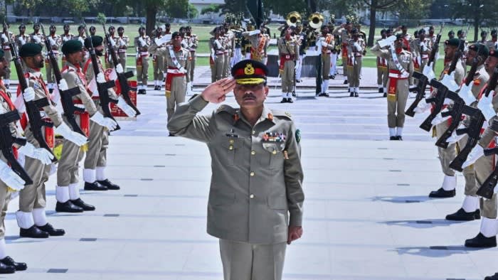 Asim Munir saluting at an outdoor ceremony in Rawalpindi, Pakistan on May 21 2025