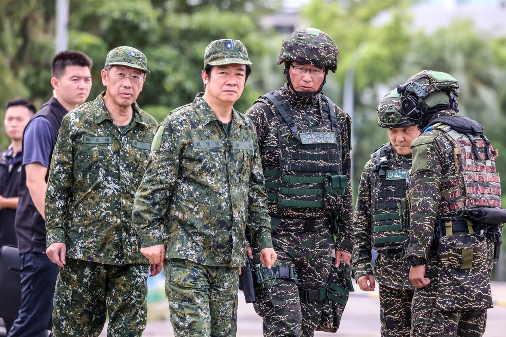 Taiwanese leader William Lai Ching-te (centre) oversees a naval minelaying drill on Monday. Photo: AFP