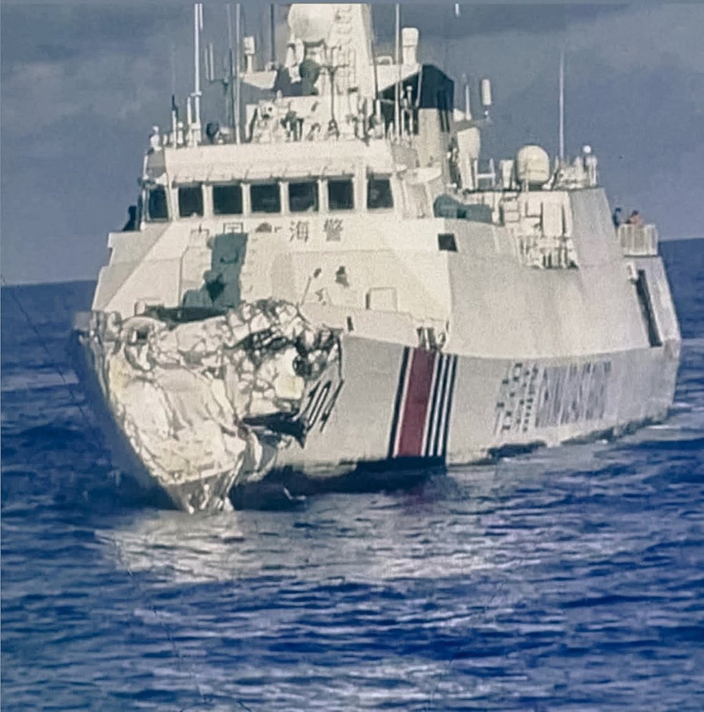 A Chinese coastguard vessel is pictured on Monday in the South China Sea after an apparent collision with another Chinese ship. Photo: Philippine Coast Guard