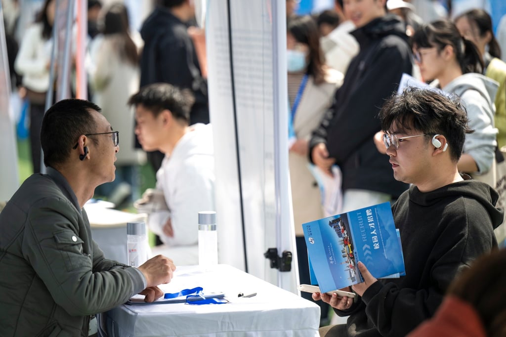 Young applicants often seek employment at job fairs, such as this one in China’s Hubei province. Photo: Xinhua