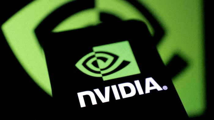 Nvidia logo displayed on a screen, with a larger, blurred version of the logo in the green background.