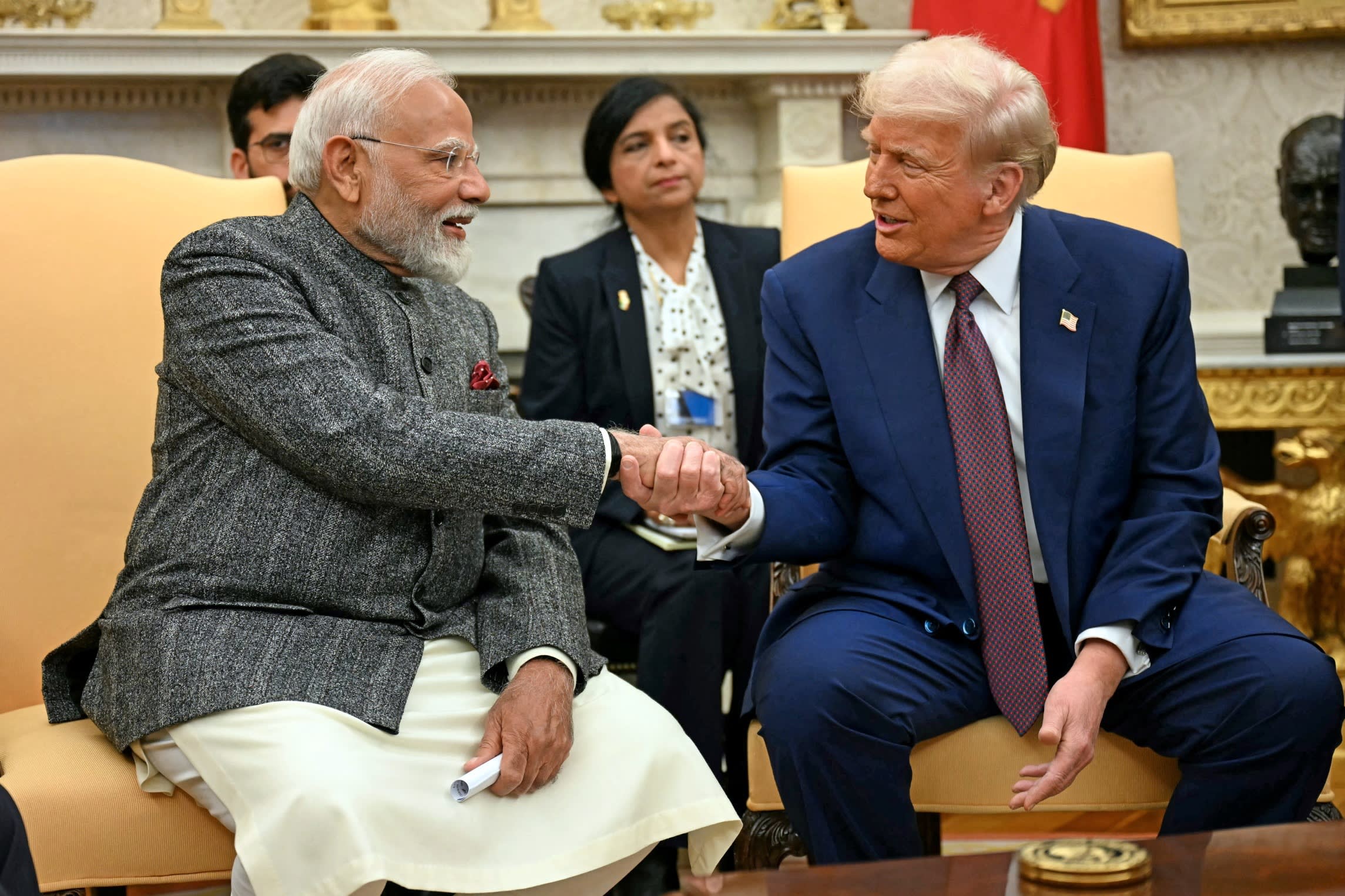 President Donald Trump shakes hands with Indian Prime Minister Narendra Modi in the Oval Office of the White House