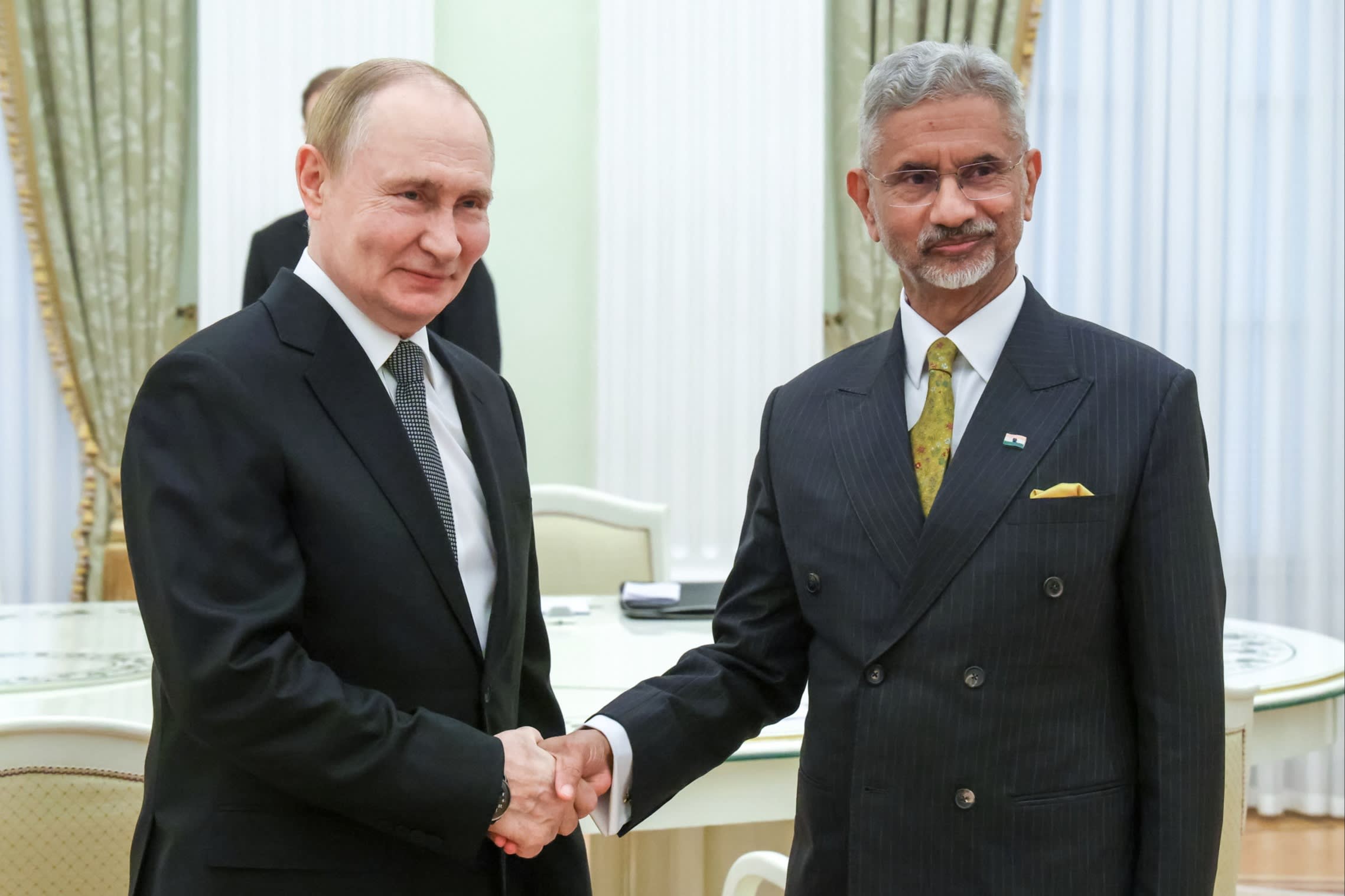 Russian President Vladimir Putin and Indian foreign minister Subrahmanyam Jaishankar shake hands during a meeting in Moscow on August 21 2025