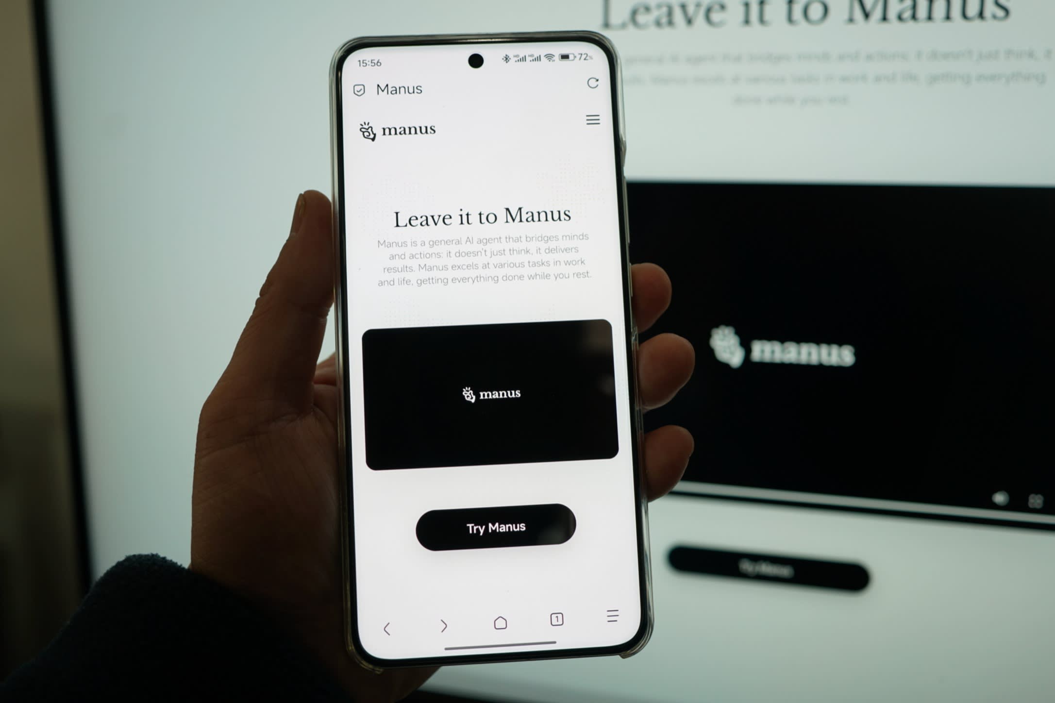 The Manus homepage is displayed on a mobile phone and computer