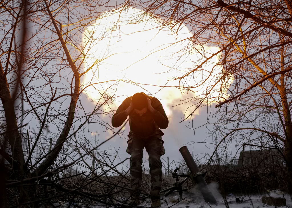 A Ukrainian serviceman reacts after firing a mortar towards Russian troops at a frontline near the town of Vovchansk in the Kharkiv region. File photo: Reuters