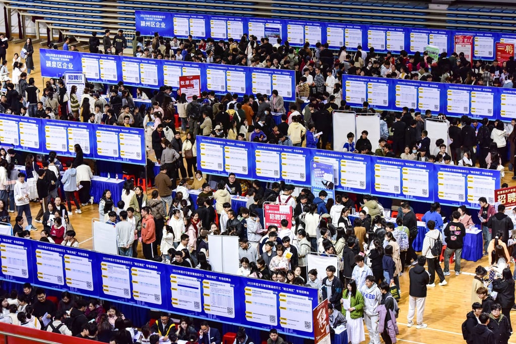 Students attend a jobs fair in China’s eastern Anhui province. China’s youth unemployment rate soared to 18.9 per cent last month as millions of fresh graduates entered the job market. Photo: Getty Images