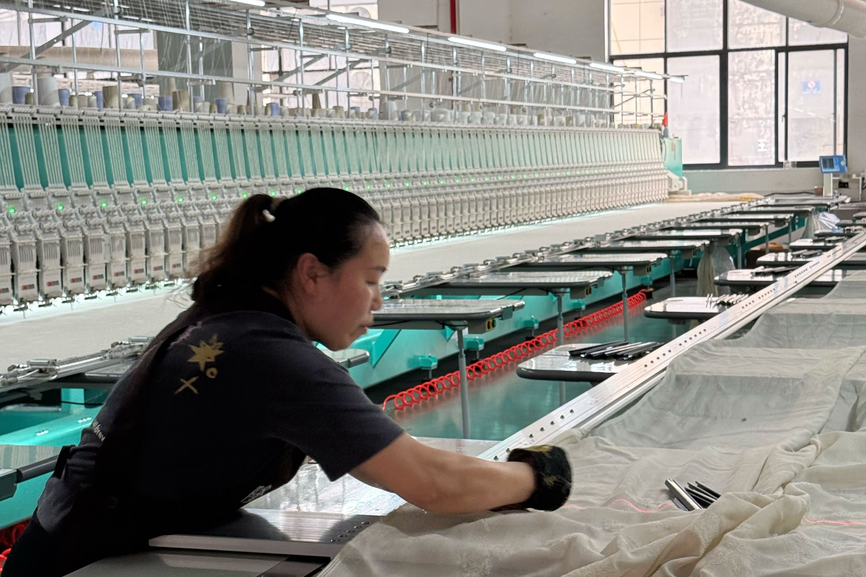 Longkai Textile has purchased several massive printing and embroidery machines to replace workers and increase productivity