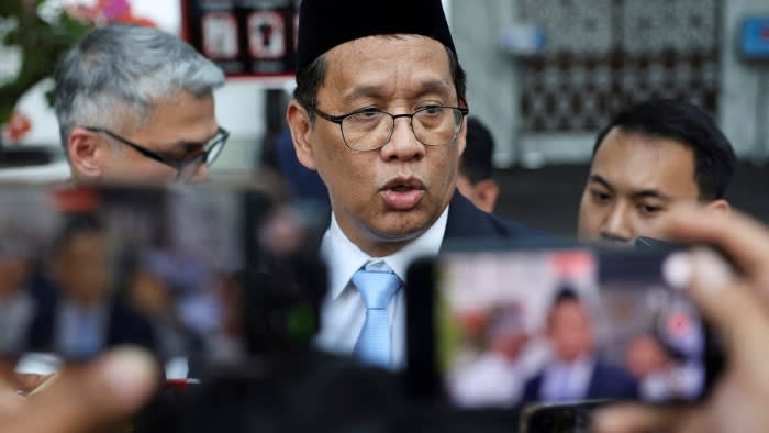 Indonesia’s newly appointed finance minister Purbaya Yudhi Sadewa speaks to journalists after his inauguration at the Presidential Palace in Jakarta