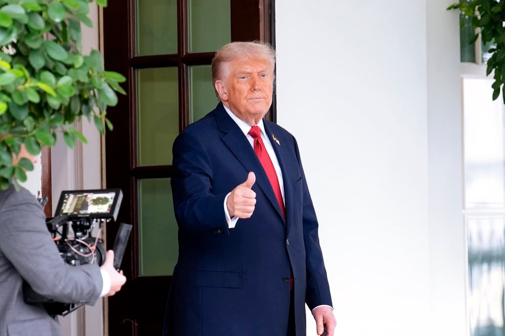 US President Donald Trump gives a thumbs-up after saying goodbye to Turkish President Recep Tayyip Erdogan following their meeting at the White House in Washington, DC, on Thursday. Photo: EPA/YURI GRIPAS /POOL