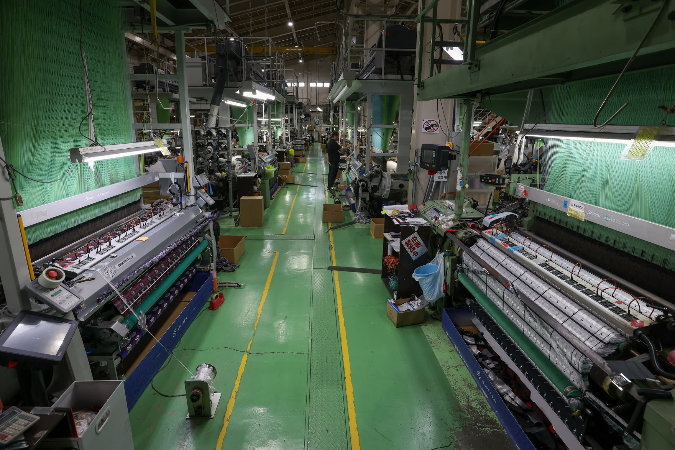 An employee works in an factory floor at Matsukawa Rapyarn