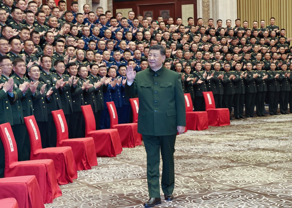 Xi meets with representatives of military personnel stationed in Urumqi in Xinjiang on Tuesday. Photo: Xinhua via AP Xi meets with representatives of military personnel stationed in Urumqi in Xinjiang on Tuesday. Photo: Xinhua via AP