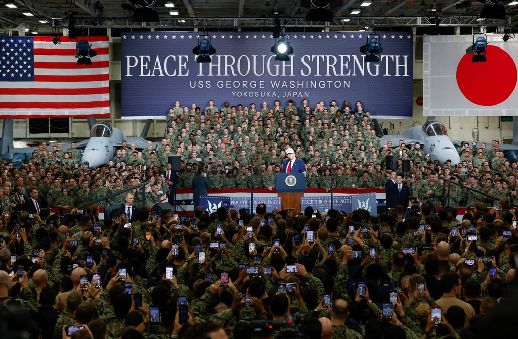 Donald Trump gives a speech aboard the aircraft carrier USS George Washington at the US Navy base in Yokosuka, Japan on Tuesday. Photo: Reuters