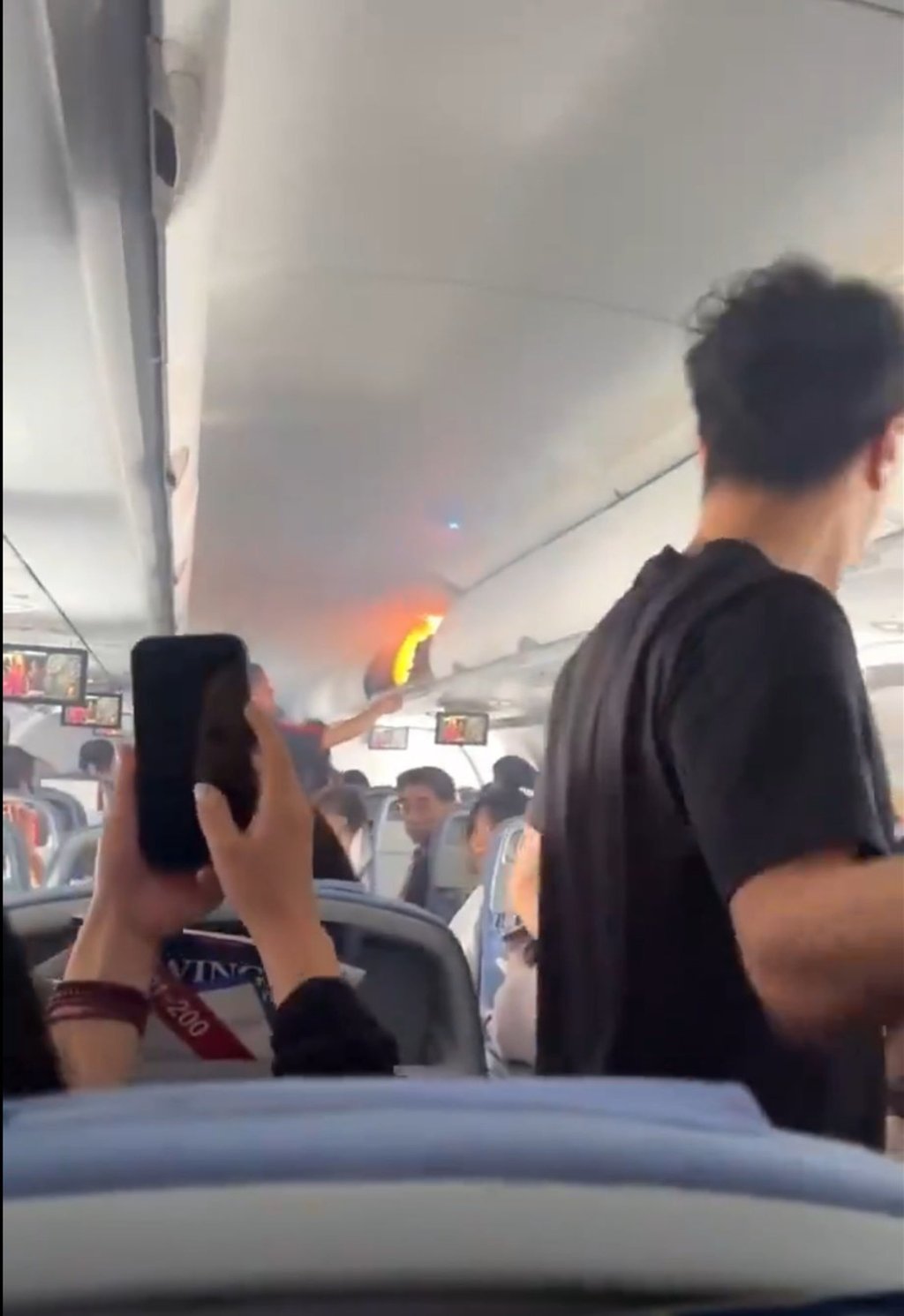 Passengers aboard the Air China flight on Saturday were heard yelling “hurry up” in Korean. Photo: Handout Passengers aboard the Air China flight on Saturday were heard yelling “hurry up” in Korean. Photo: Handout