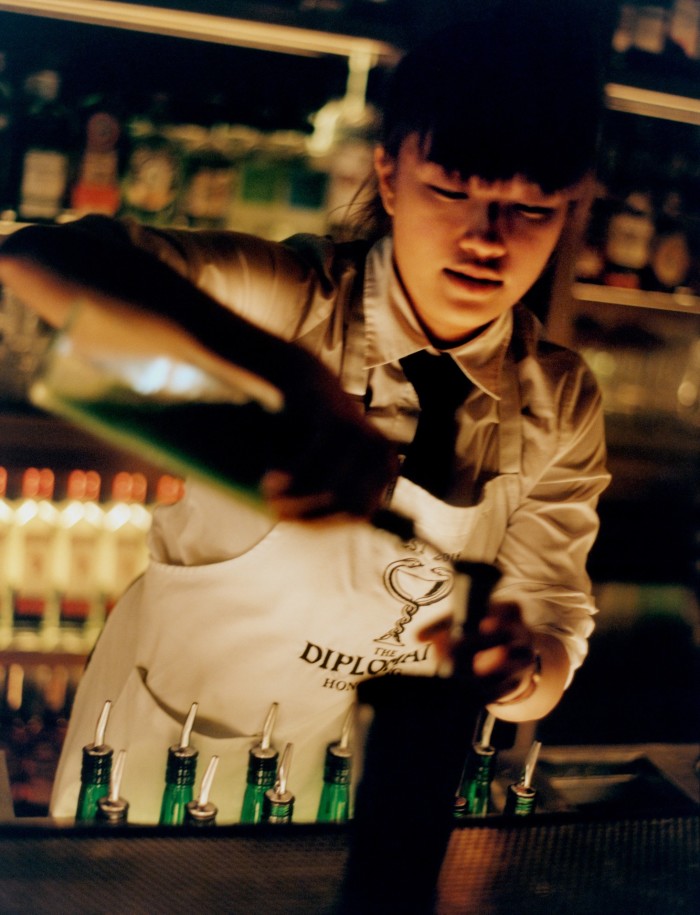 A bartender at The Diplomat in the H Code complex