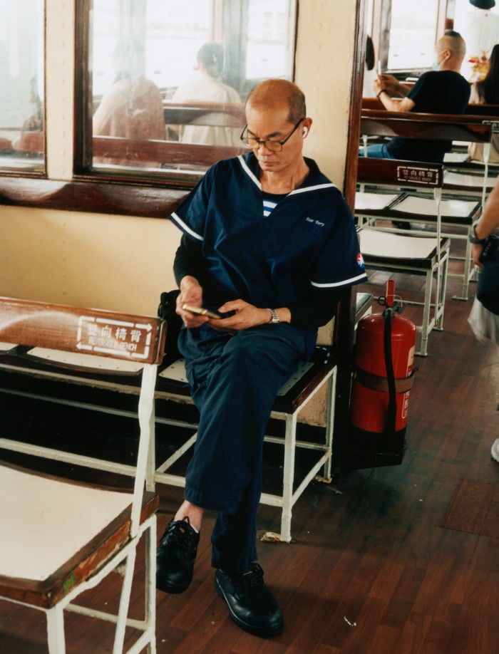 An employee on the Star Ferry that crosses Hong Kong’s harbour