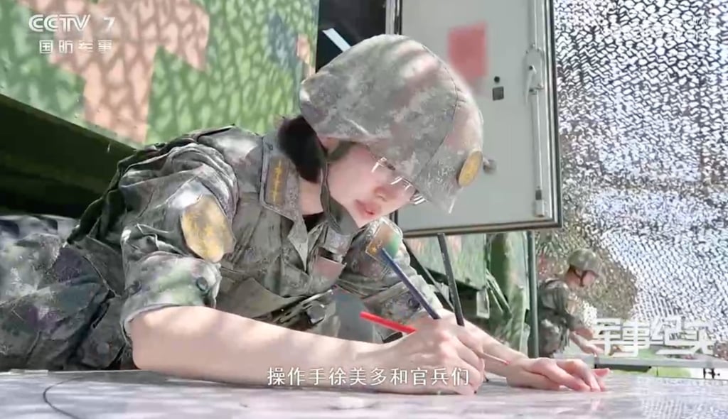 Captain Xu Meiduo has mastered abacus calculation techniques and traditional tools, such as paper, pen and ruler, as part of China’s strategic push to blend ancient methods with modern warfare tactics. Photo: CCTV Captain Xu Meiduo has mastered abacus calculation techniques and traditional tools, such as paper, pen and ruler, as part of China’s strategic push to blend ancient methods with modern warfare tactics. Photo: CCTV