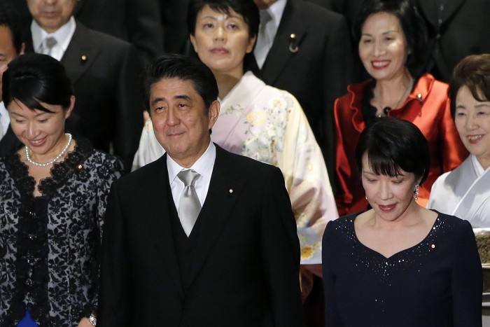 The then-Japanese prime minister Shinzo Abe and Sanae Takaichi in 2014