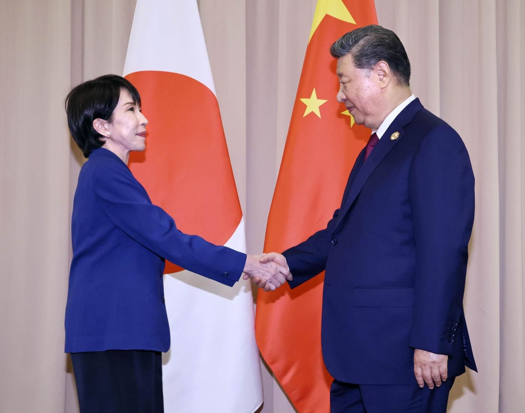 Japanese Prime Minister Sanae Takaichi greets Chinese President Xi Jinping ahead of their talks in Gyeongju, South Korea, on Friday. Photo: Kyodo