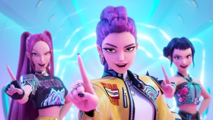 Mira, Rumi, and Zoey stand in formation with confident expressions, each holding up one finger in a glowing, futuristic setting.