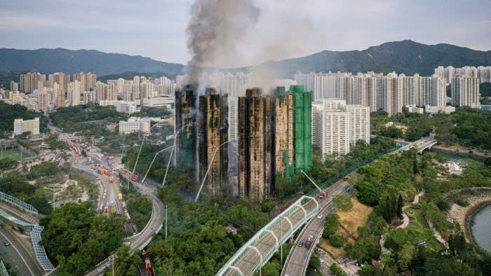 Smoke billows from an apartment fire in the Tai Po district of Hong Kong.