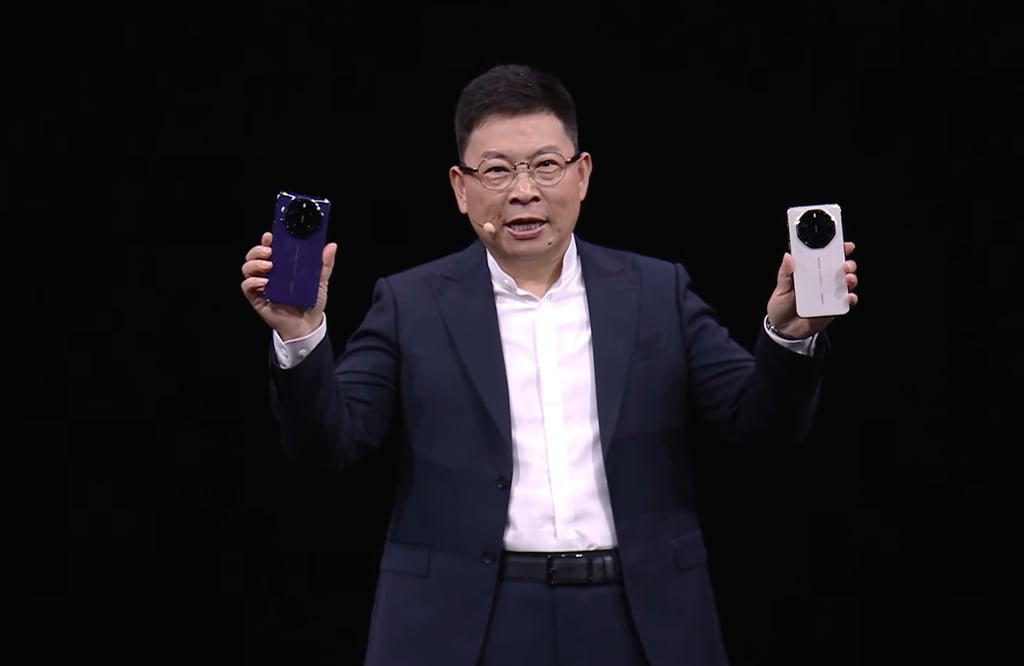 Richard Yu Chengdong, the chairman of Huawei Technologies’ consumer business group, shows two high-end Mate 80 RS smartphones at Tuesday’s live-streamed product launch. Photo: Handout Richard Yu Chengdong, the chairman of Huawei Technologies’ consumer business group, shows two high-end Mate 80 RS smartphones at Tuesday’s live-streamed product launch. Photo: Handout
