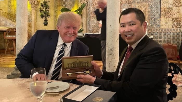 Donald Trump presents Indonesian billionaire Hary Tanoesoedibjo with a key to the White House at Mar-a-Lago in 2022