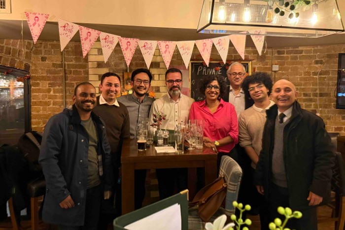 A group photo of Tee Zhuo and Veena Venugopal with India Business Briefing readers