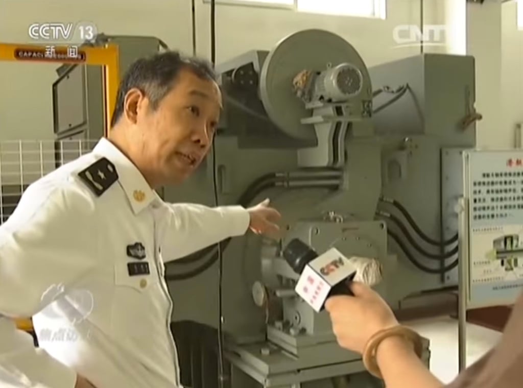 Rear Admiral Ma Weiming, as he appeared in 2017 on state television advocating for China to develop an electromagnetic catapult system for its next aircraft carrier. Photo: CCTV