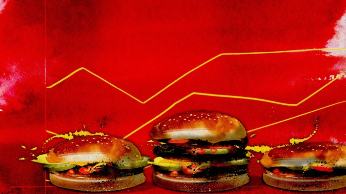 An illustration of three burgers on a red background with yellow lines resembling financial charts, symbolising economic themes.