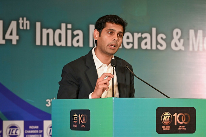 Abhyuday Jindal speaks at a podium during the 4th India Minerals and Metals Forum in New Delhi