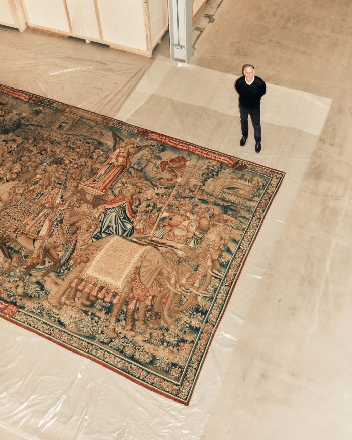 Tim Reeve, deputy director and COO of the V&A, with The Triumph of Fame over Death tapestry, c1507-1510