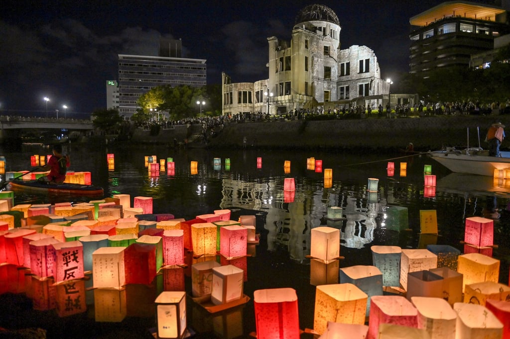 People attend a lantern-floating ceremony at the Hiroshima Peace Memorial Park in Japan. Photo: Getty Images