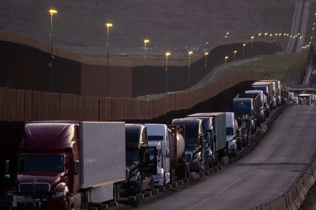 Trucks queue near the US-Mexico border before proceeding to the Otay Commercial crossing in Tijuana, a city in the Mexican state of Baja California, on March 4, 2025. Photo: AFP