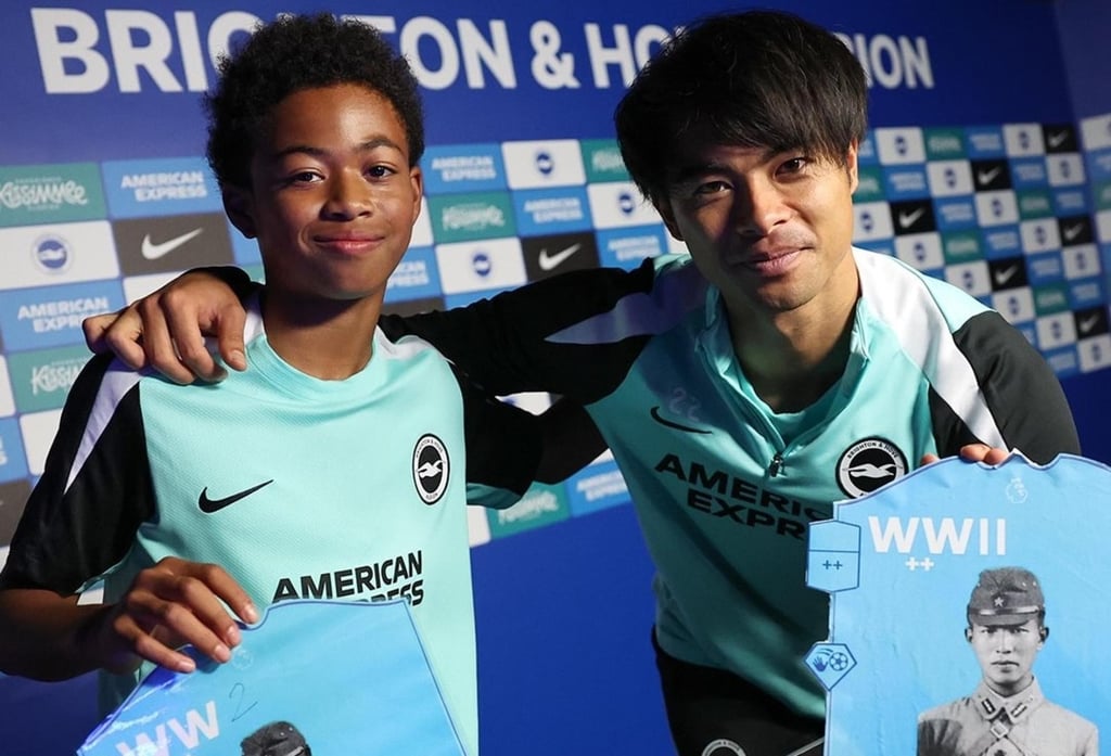 A social media post shows Japanese international Kaoru Mitoma and a youth player posing with football cards depicting the image of a Japanese World War II soldier accused of war crimes. Photo: Handout