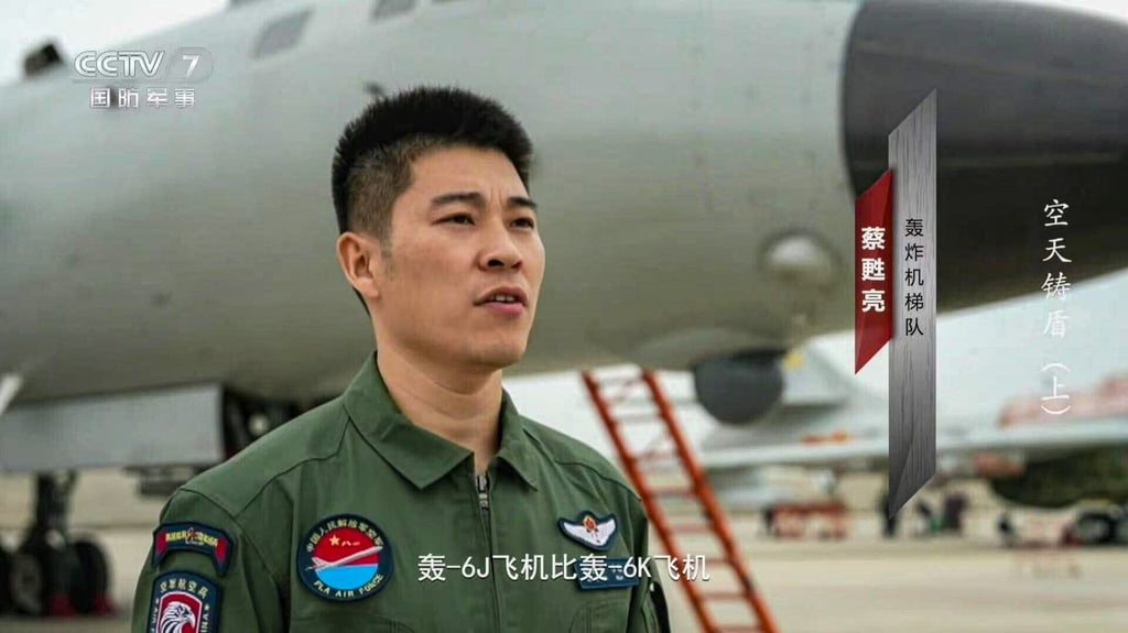 Cai Suliang, identified in a CCTV report as a member of an unspecified PLA bomber formation, says the H-6J can “see maritime targets at greater distances and across a wider area”. Photo: CCTV
