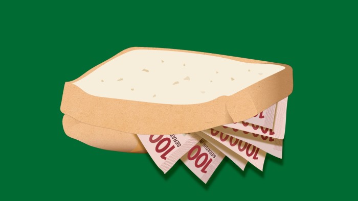 Efi Chalikopoulou of 100 rupiah notes sandwiched between two slices of bread