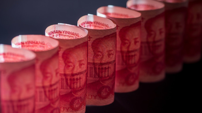 Rolled Chinese one-hundred yuan banknotes