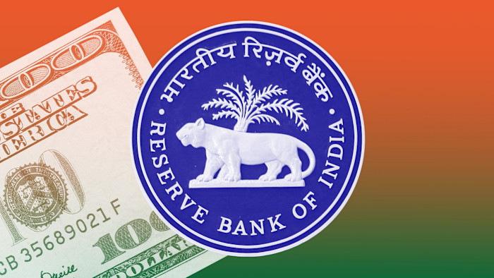 Reserve Bank of India logo overlaid on a $100 bill with a tricolour background.