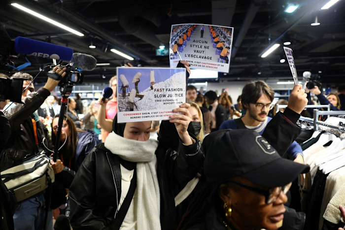 People protest against Shein inside its first physical shop in France, in the Paris department store BHV, after reports emerged that third-party sellers on the platform’s online marketplace were selling ‘paedopornographic’ sex dolls and weapons