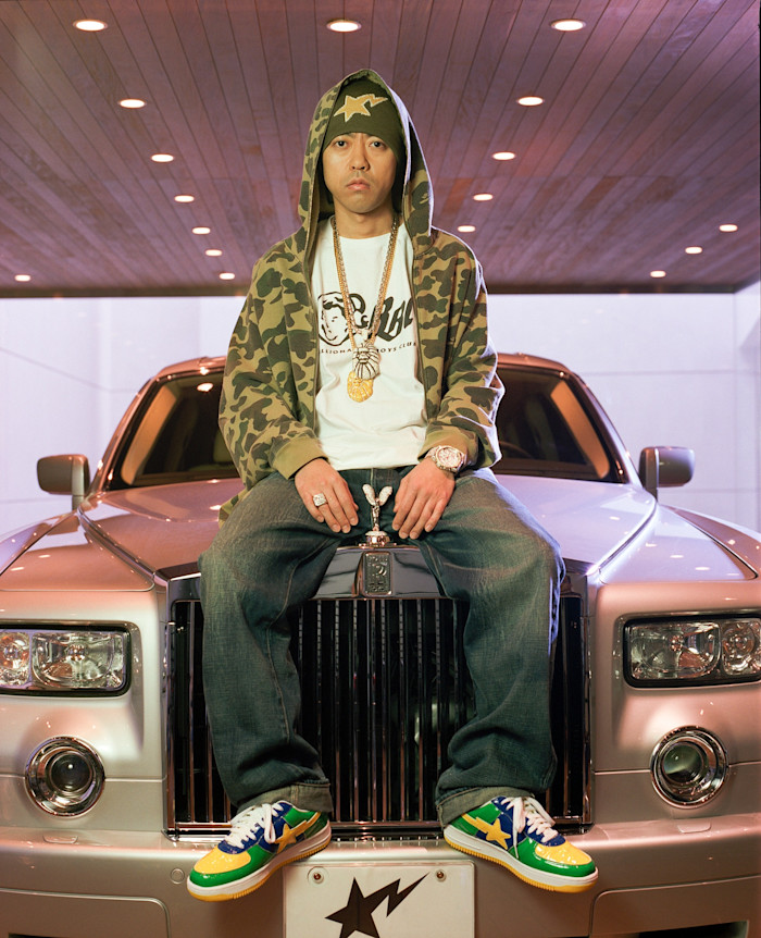 Photographed sitting on his Rolls-Royce in&nbsp;2004