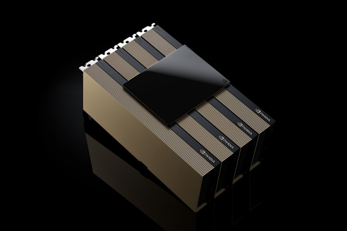 Nvidia H200 chip with a large black heat spreader and gold-colored fins, featuring the Nvidia logo on the side.