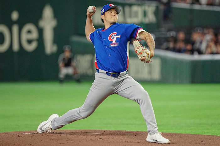Chen Zhong-Ao Zhuang of Taiwan pitches during a World Baseball Classic game against Czech Republic