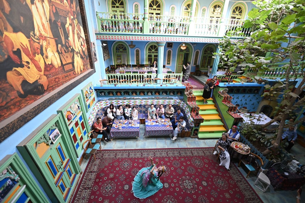 A performer dances at a homestay in the old town of Kashgar, a Silk Road city in northwest China’s Xinjiang. Photo: Xinhua A performer dances at a homestay in the old town of Kashgar, a Silk Road city in northwest China’s Xinjiang. Photo: Xinhua