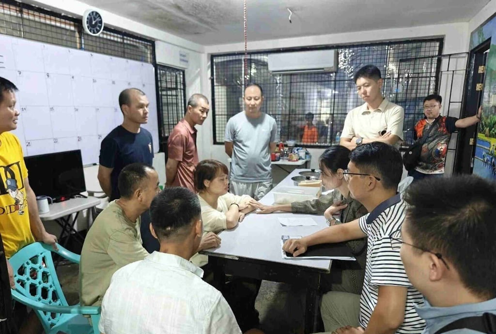 Consular officials assist Chinese nationals after their release from Philippine custody in May. Photo: Embassy of China in the Philippines Consular officials assist Chinese nationals after their release from Philippine custody in May. Photo: Embassy of China in the Philippines