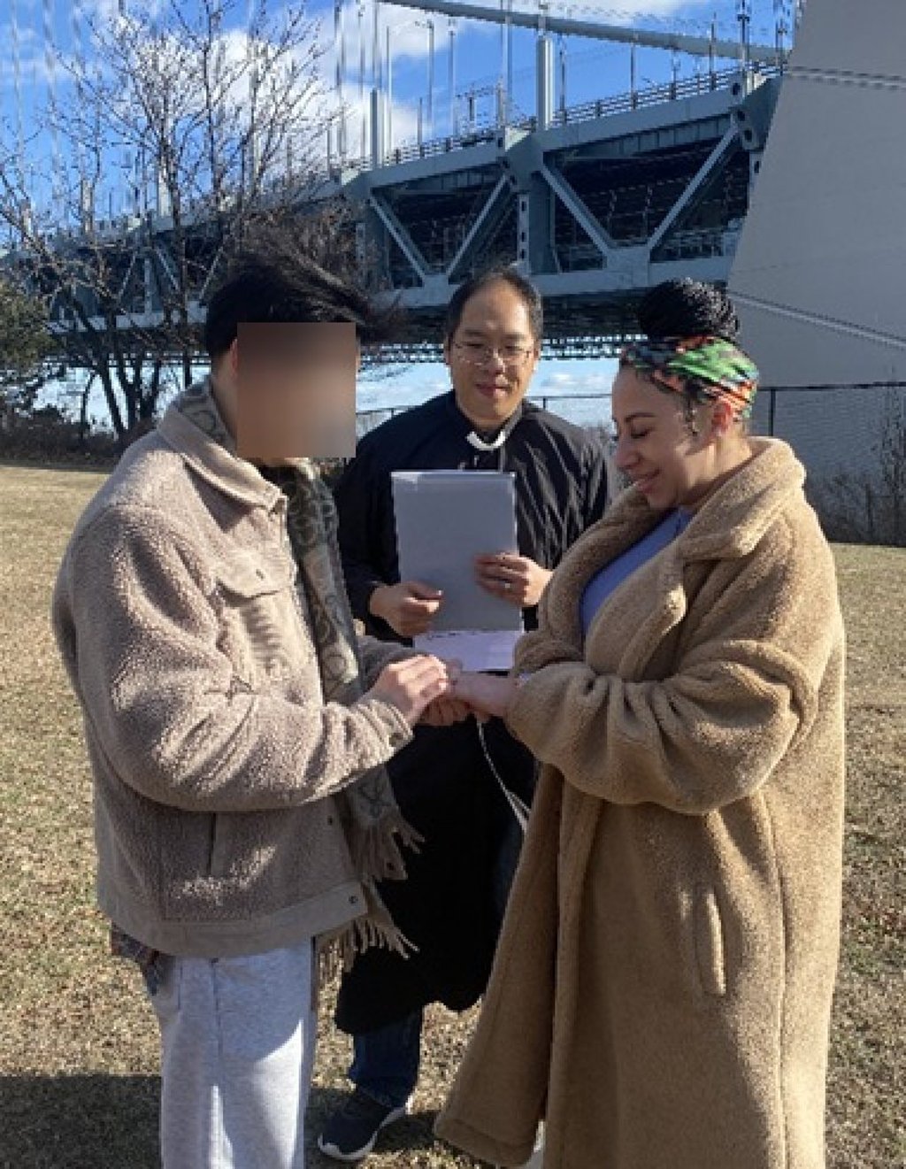 In an image from the US federal court indictment, a foreign national (left), Anthony Cheng (centre) and Erika Johnson take part in a sham marriage ceremony on or about January 15, 2025. Photo: Handout In an image from the US federal court indictment, a foreign national (left), Anthony Cheng (centre) and Erika Johnson take part in a sham marriage ceremony on or about January 15, 2025. Photo: Handout
